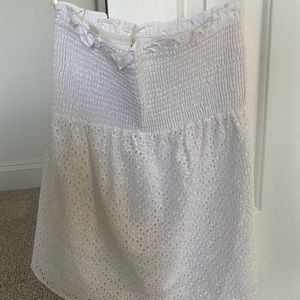 White tube top with detailing throughout.